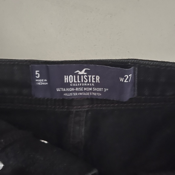 Multiple button up black denim shorts - Picture 2 of 3